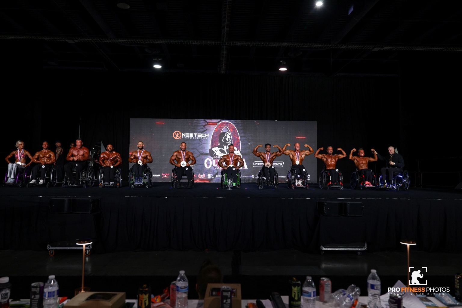 The wheelchair bodybuilding competitors lined up onstage at the 2025 Olympia in Las Vegas.