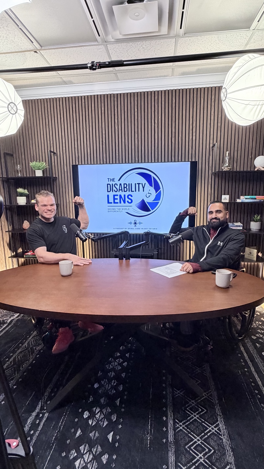 Bray at a recording of The Disability Lens podcast with the host.